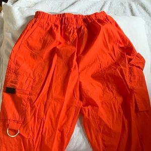 Orange parachute pants